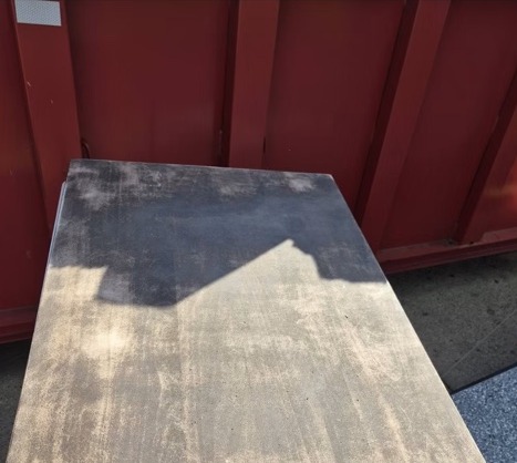 Worn tabletop before True Grit refinishing